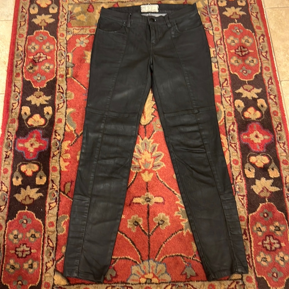 Free People black jeans. These have almost a leather like look to them. Size 26.